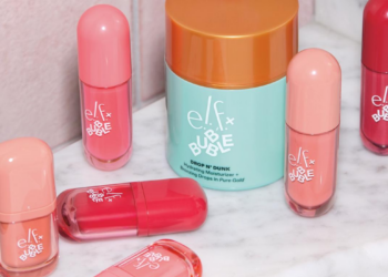 Assorted e.l.f. x Bubble makeup and skin-care products, including blush, lip and bronzing formulas, arranged on a marble surface.